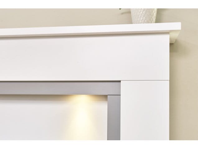 adam genoa fireplace against the wall in white and grey