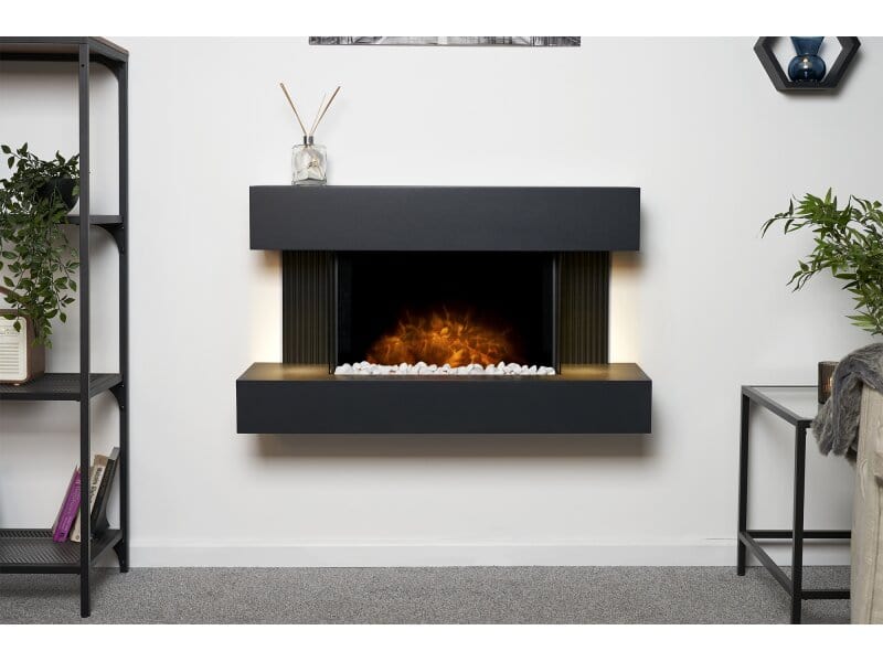 In living room Adam Manola electric fire mounted on wall 