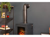 tall angled stove pipe in black connected to wall and the Adam Bergen XL electric stove