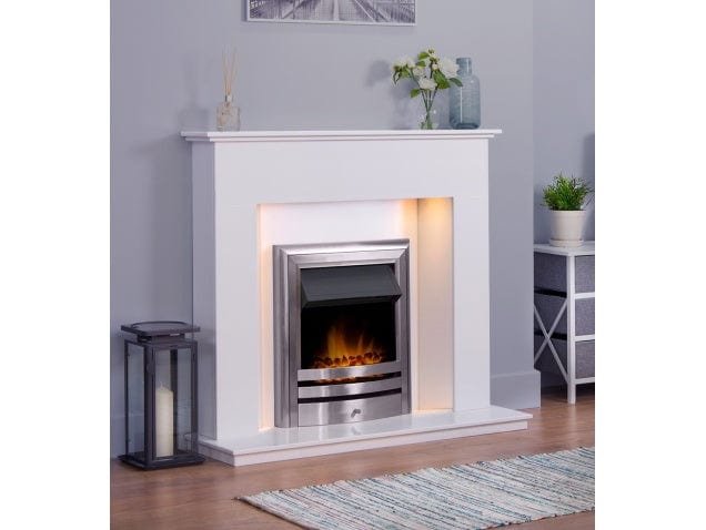 White marble fireplace with lights in a living room with fire