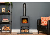 Adam Bergen XL stove with tall angle pipe in black in living room