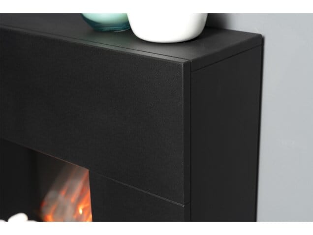 zoom in on the black of the electric fireplace suite call adam cubist