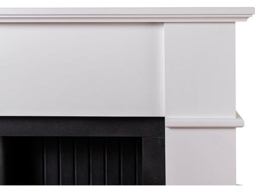 corner showing the black and white edges of adam oxford stove fireplace