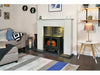 the stove called woodhouse by adam in a lounge area with a white wall and a fireplace in white