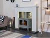 pipe and grey woodhouse stove in a white fireplace made by adam and a brown sofa